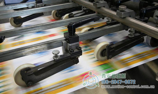 磁性旋转编码器确保印刷设备中同步滚轴的运动