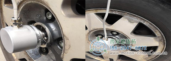 图为编码器测量汽车车轮转速的应用照片